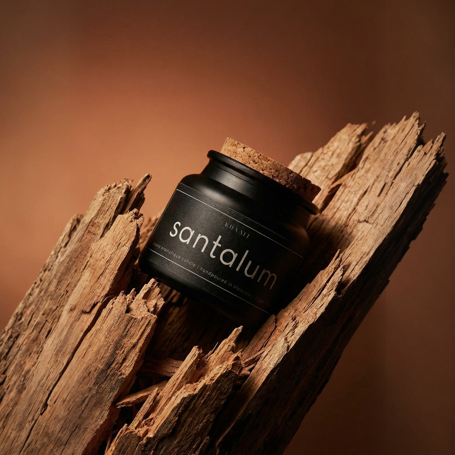 Santalum scented candle by KHAALI with sandalwood fragrance.